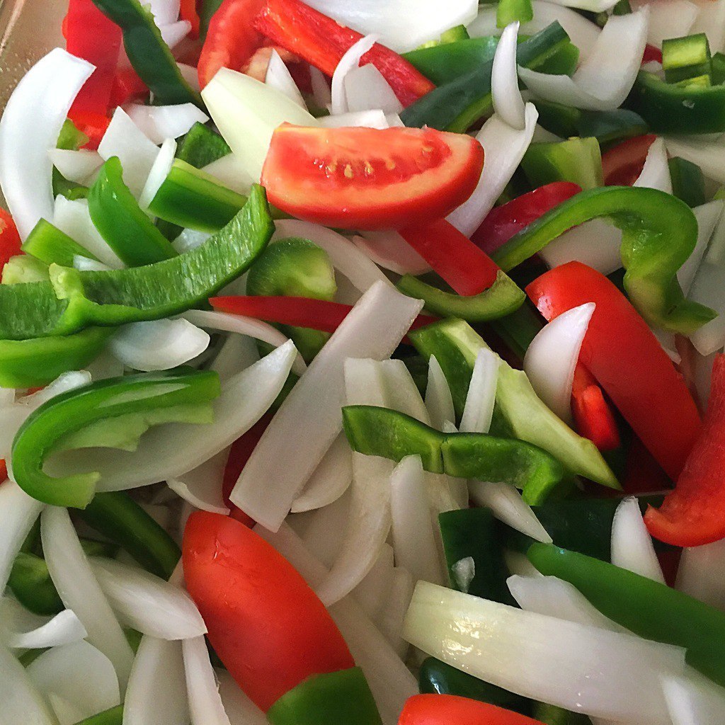 Sliced bell pepper, onions, jalepenos, and tomatoes