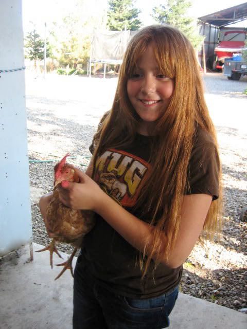Kristi with a Hen