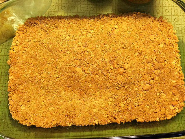 Press Graham Cracker Crumbs into Pan