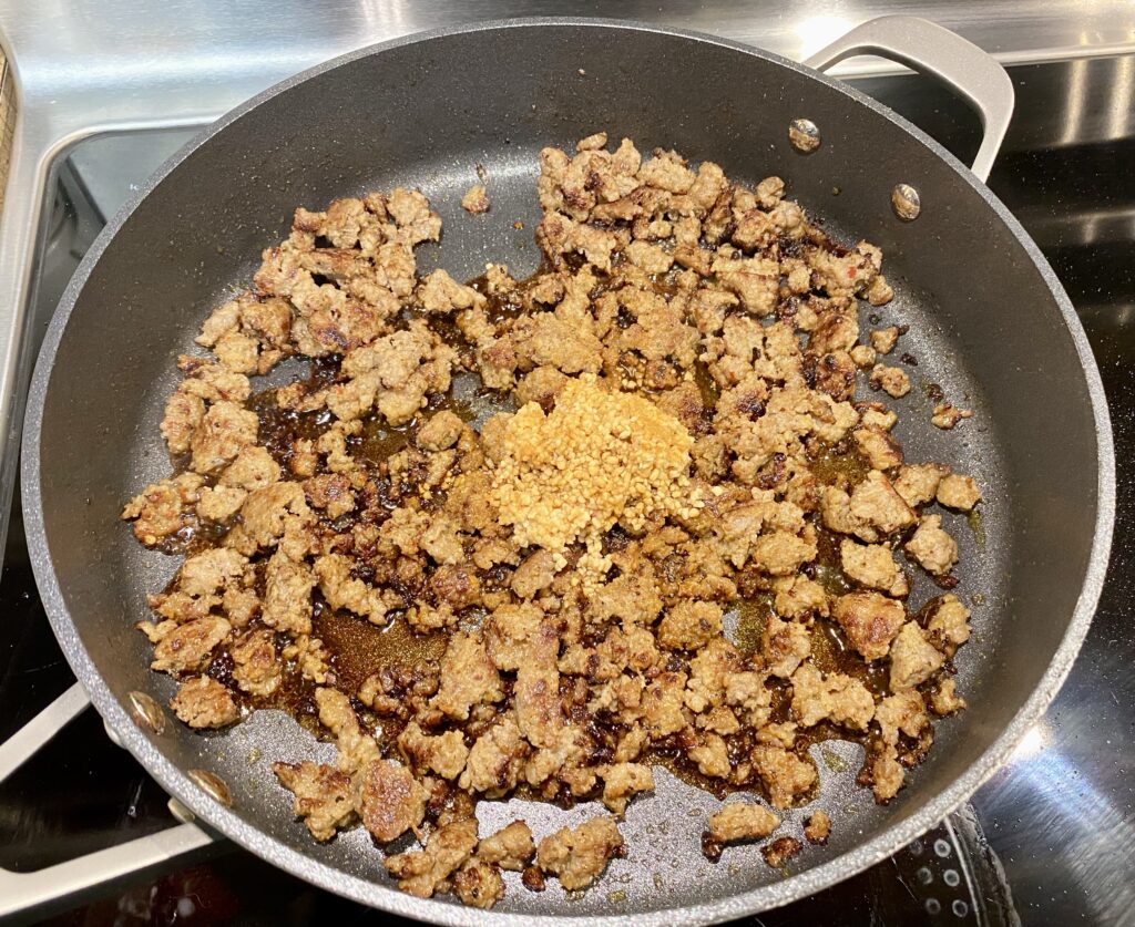 Keto Crack Slaw Browned Sausage with Garlic and Soy Sauce