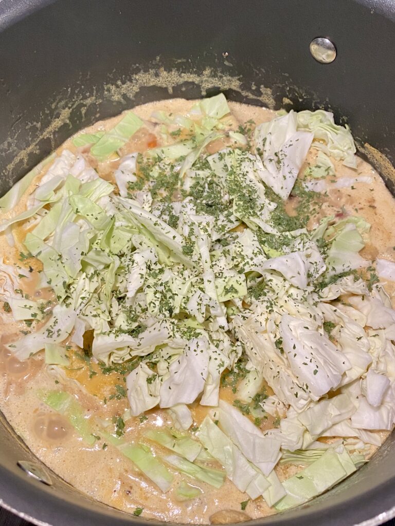 Add cabbage and parsley to keto sausage soup