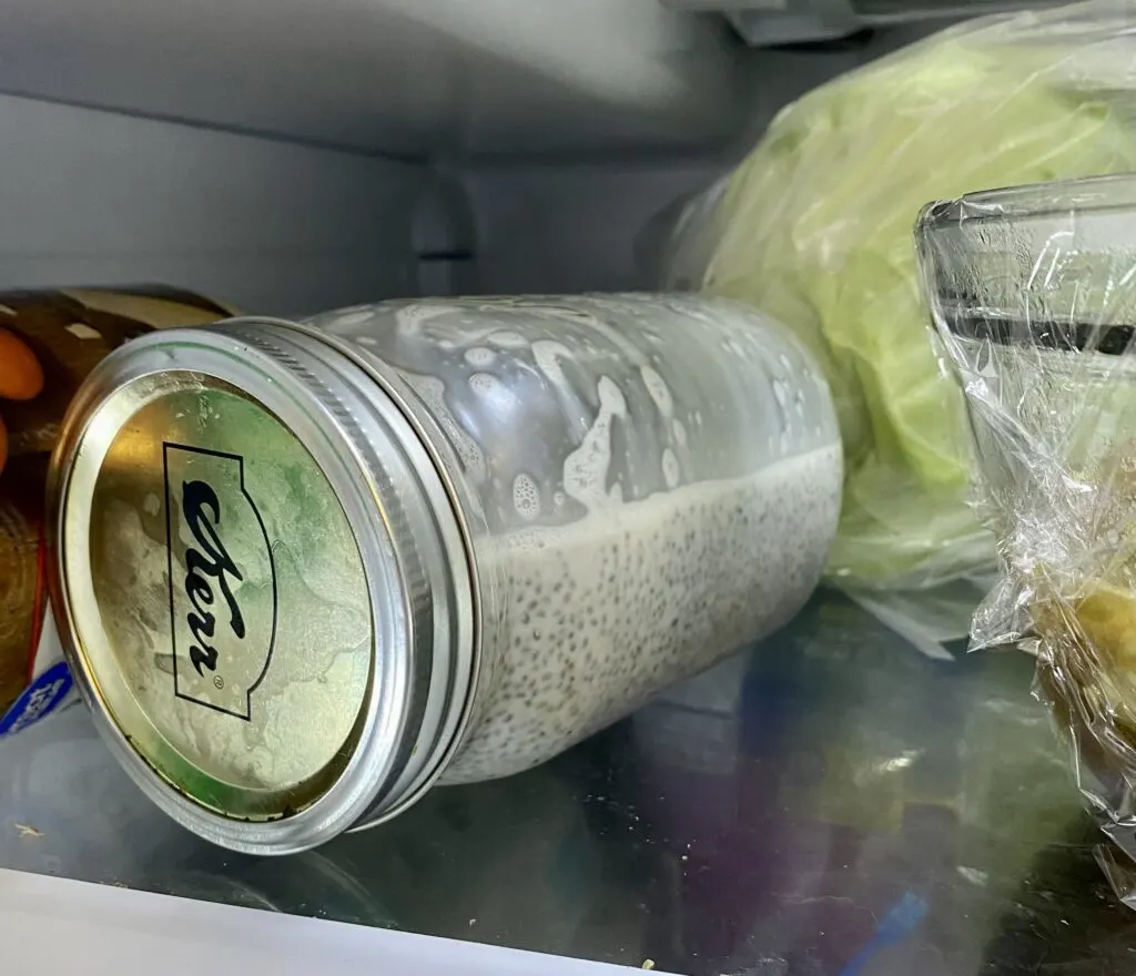 Premium Photo  Chia seed milk pudding and dry seeds in glass jars