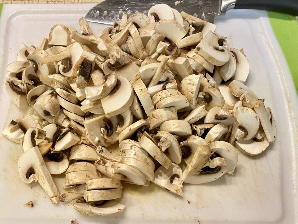 Sliced mushrooms keto sausage soup recipe.